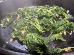 Sautéing stinging nettles